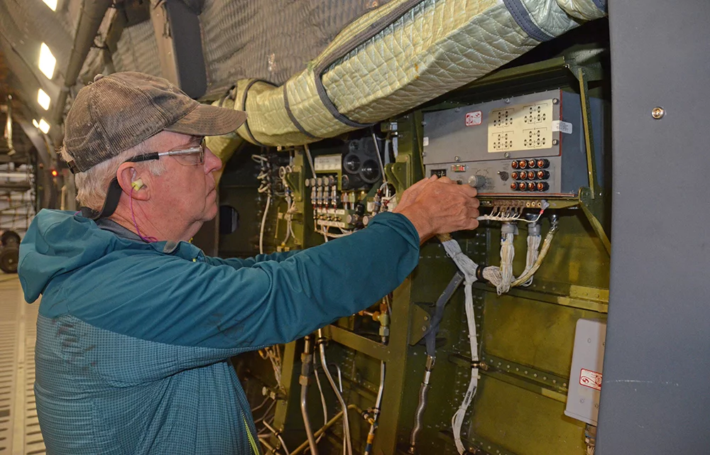 Tom Richardson, electrician, works on the Anti-skid control box inside the C-5 cargo bay May 3 on Robins Air Force Base, Ga. (U.S. Air Force photo by Tech. Sgt. Kelly Goonan/released)